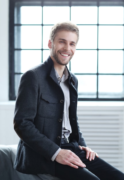 Happy smiling handsome man posing