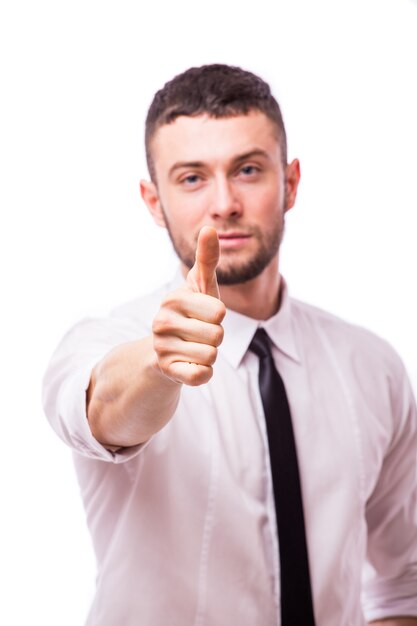 Happy smiling young business man with thumbs up gesture, isolated over white wall