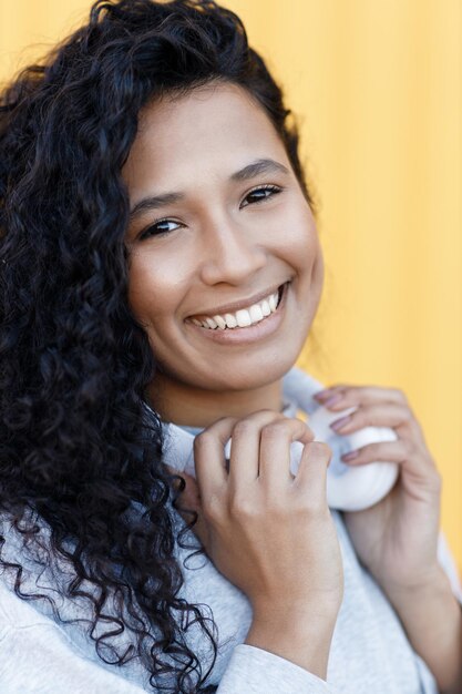 happy smiling young woman outdoor with headphones