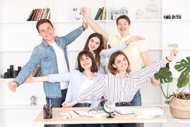 Happy students looking at camera