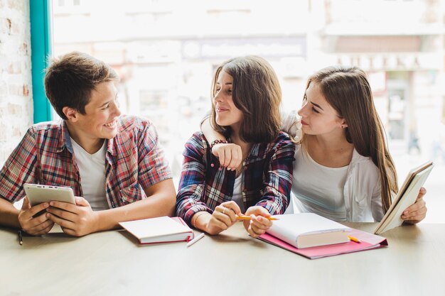 Happy students posing together