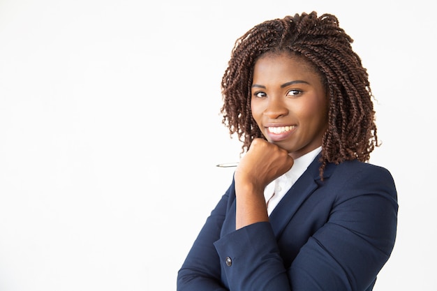 Happy successful business trainer holding pen