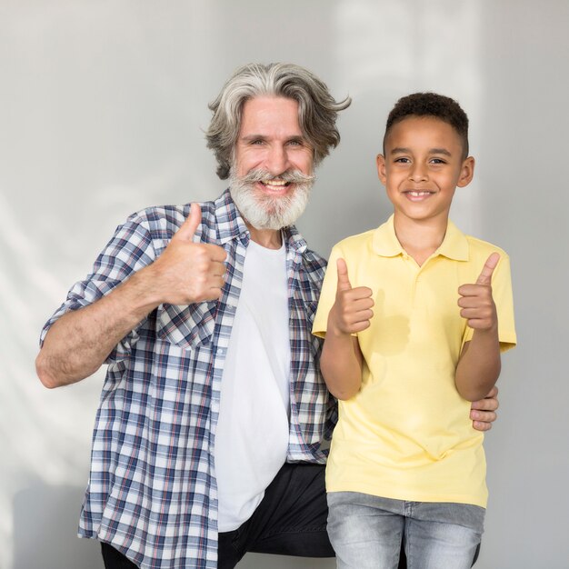 Happy teacher and student posing