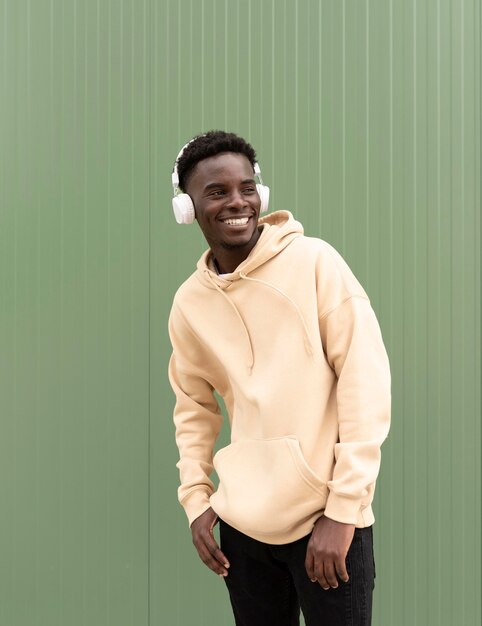 Happy teen posing with headphones