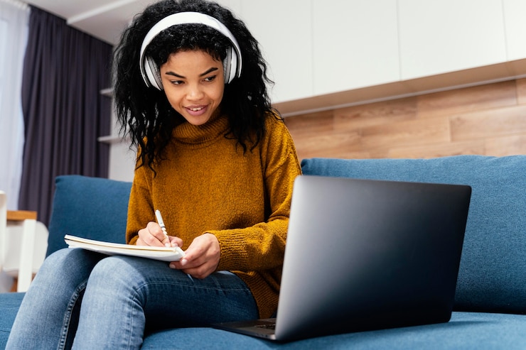 Free Photo happy teenage girl with headphones during online school