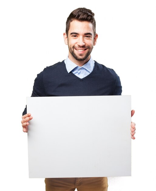 Happy teenager with an empty poster