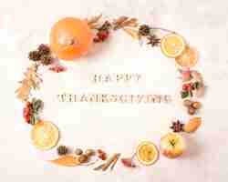 Free photo happy thanksgiving frame with citrus and autumn leaves