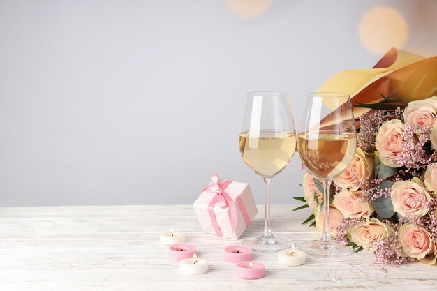 Happy valentine day composition on white wooden table