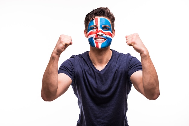 Free photo happy victory scream man fan support iceland national team with painted face isolated on white background