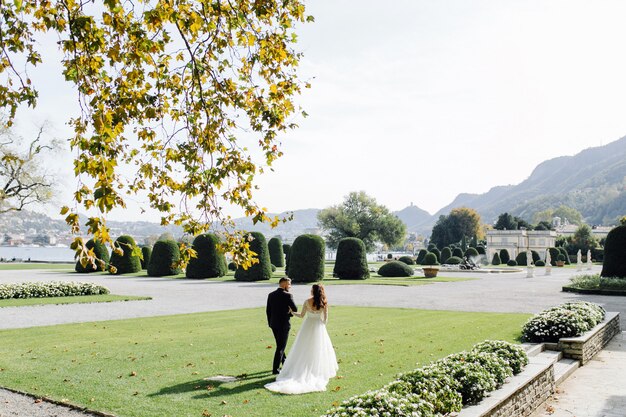 Happy wedding couple in Como Lake, Italy