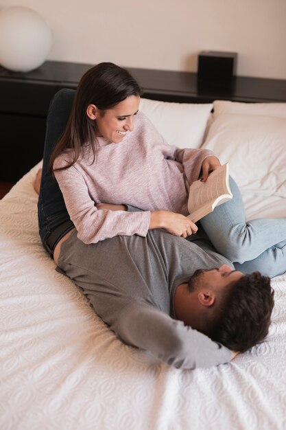 Happy wife reading book