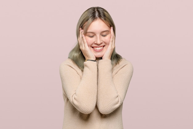 Free photo happy woman in a beige sweater