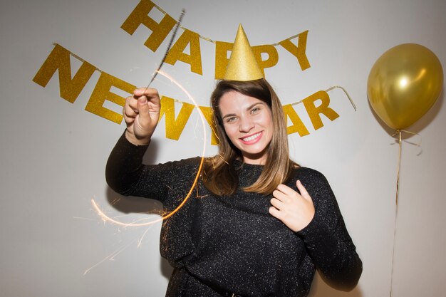 Happy woman celebrating new year