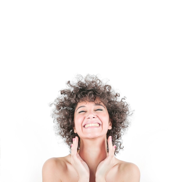 Happy woman in curly hair isolated over white background