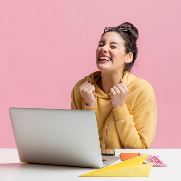 Happy woman finding plane tickets