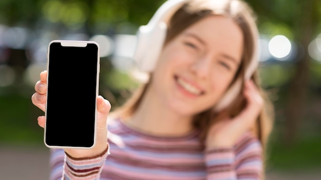 Happy woman listening to music