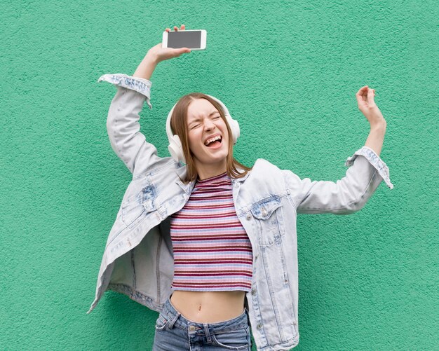 Happy woman listening to music