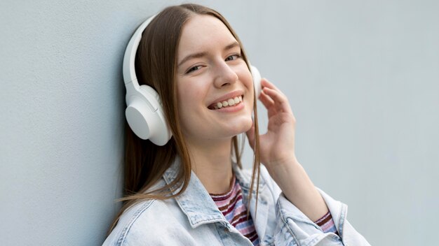 Happy woman listening to music