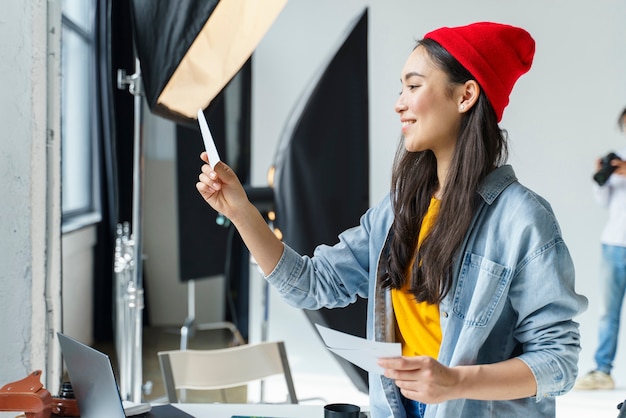 Happy woman looking at photo