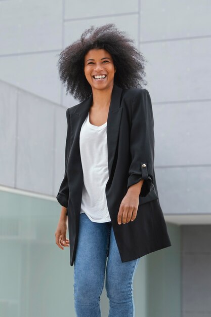 Happy woman posing outdoors