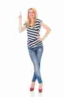 Free photo happy woman in striped blouse pointing at copyspace