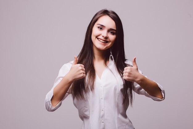 Happy woman thumbs up isolated on white background