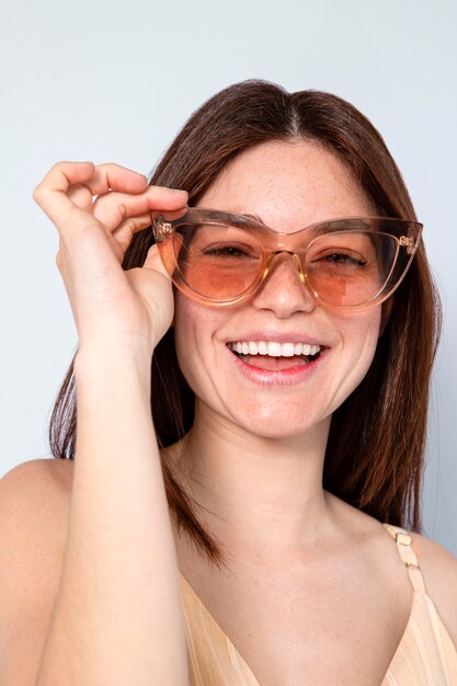 Happy woman wearing sunglasses