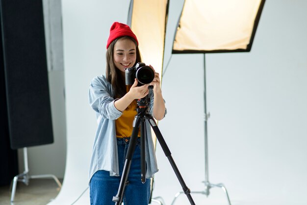 Happy woman with camera