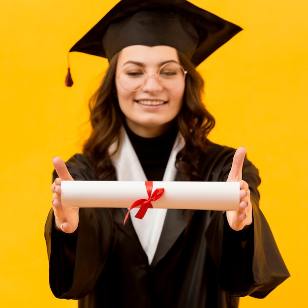 Free photo happy woman with certificate