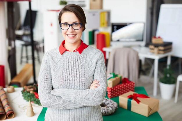 Happy woman with christmas gifts or presents