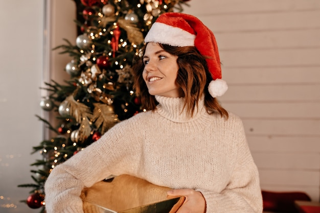 happy woman with christmas present