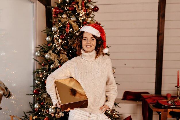 happy woman with christmas present