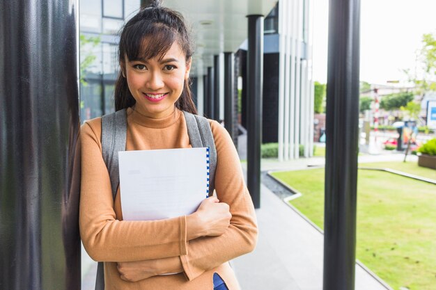 Happy woman with documents