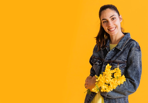 Happy woman with flower bouquet