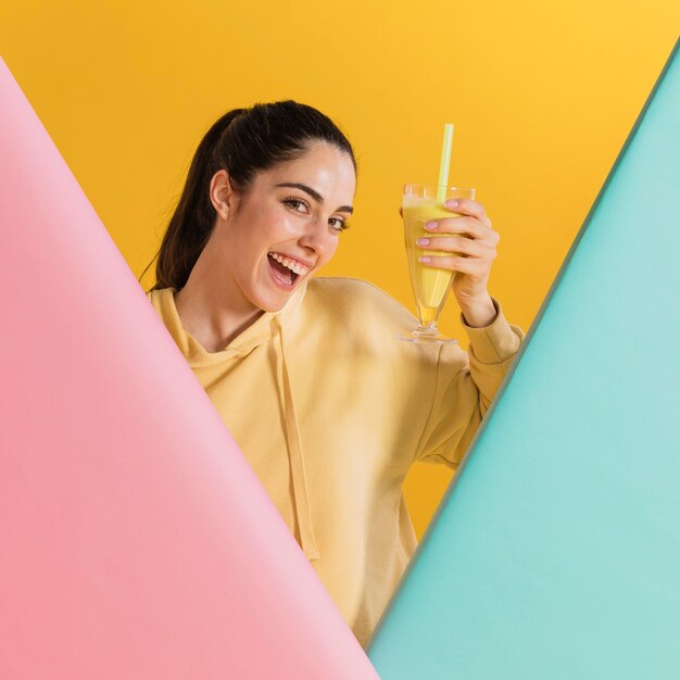 Happy woman with a glass of juice