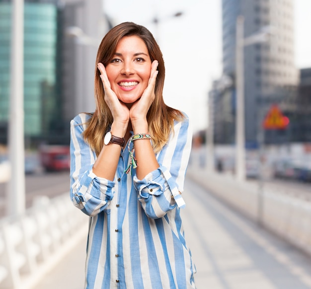 Happy Woman with Hands on Face