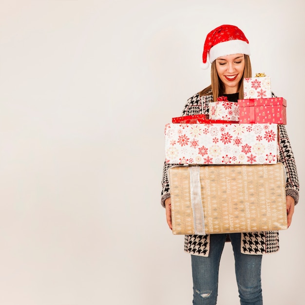 Happy woman with many presents