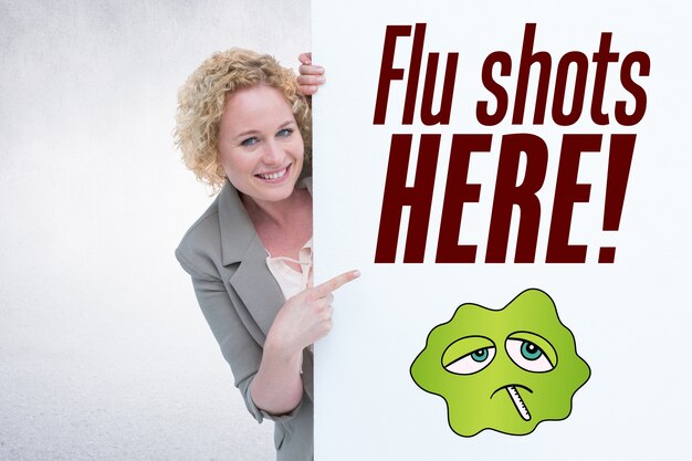 Happy woman with a poster to prevent the flu