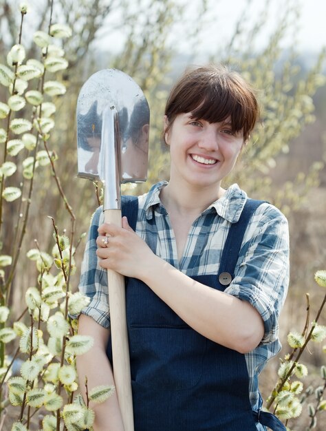 Happy  woman   with shovel