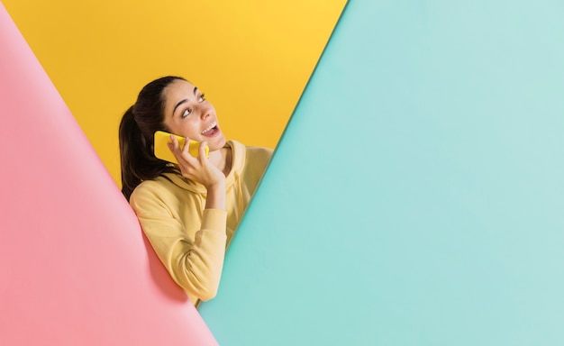 Free photo happy woman with a smartphone