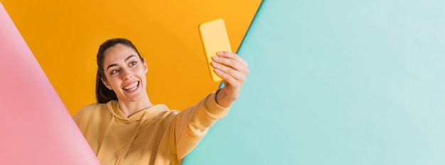 Happy woman with a smartphone