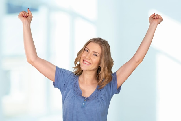 Free photo happy woman with stretched arms