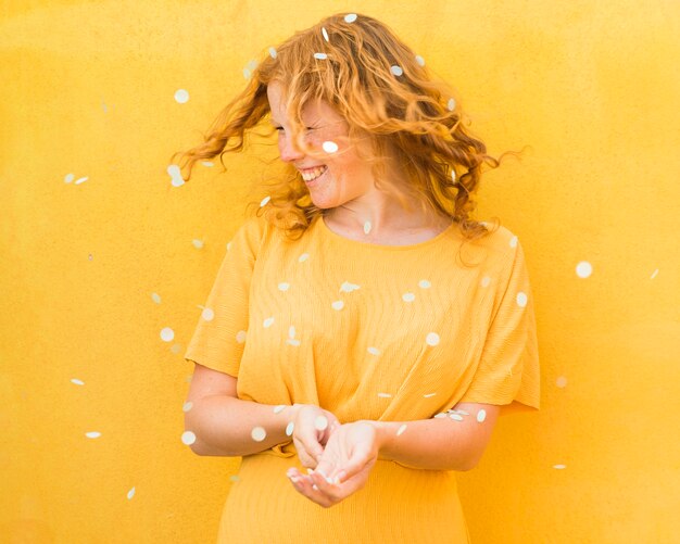 Free photo happy woman yellow dress