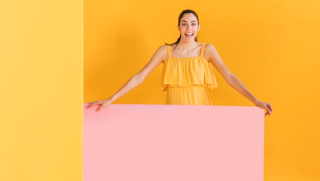 Free photo happy woman in yellow dress