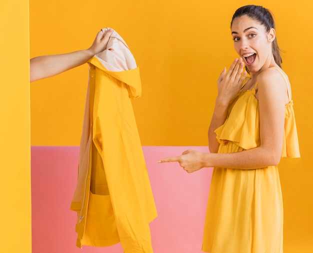 Happy woman in yellow dress