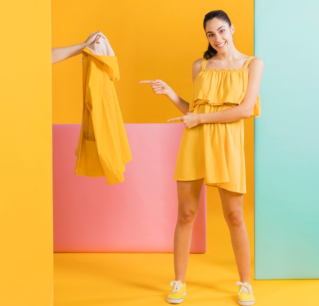 Happy woman in yellow dress