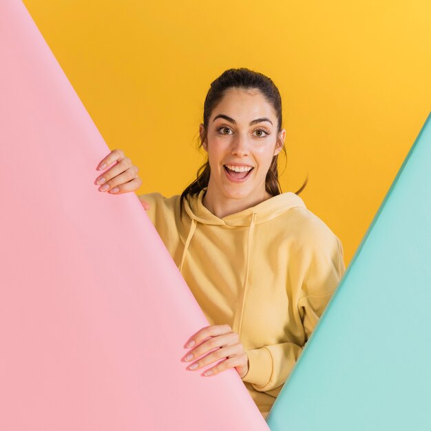 Happy woman in a yellow sweater