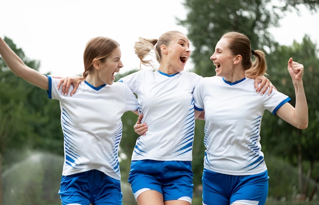 Happy women expressing victory