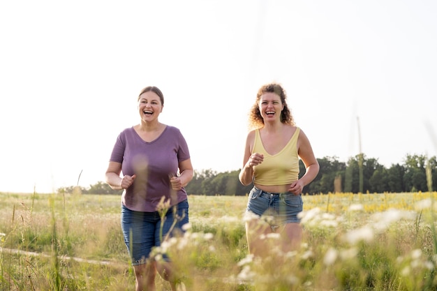 Happy women outdoors medium shot