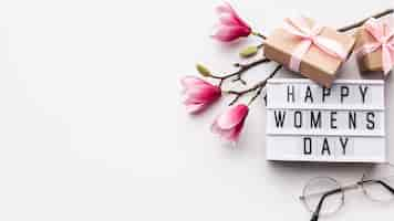 Free photo happy women's day lettering on white background with copy space